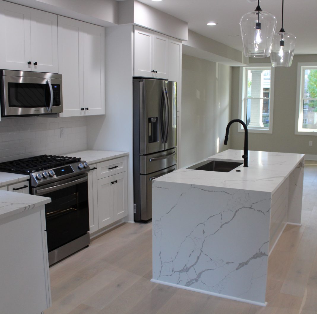 Calacatta Laza With White Shaker Cabinets Erva Stone And Design 6076